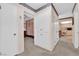 Hallway with built in storage and entryways to the bedroom and kitchen at 2012 Wendell Ave, Las Vegas, NV 89101
