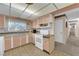 Kitchen featuring a window above the sink, white oven and ample cabinetry at 2012 Wendell Ave, Las Vegas, NV 89101