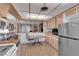 Kitchen with ample cabinetry and a view into the living room through a partial partition at 2012 Wendell Ave, Las Vegas, NV 89101