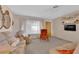 Inviting living room with comfortable seating, soft lighting and a large window at 2012 Wendell Ave, Las Vegas, NV 89101