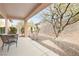 Covered patio with seating area and beautiful, low maintenance backyard at 2052 Powder Springs St, Henderson, NV 89052