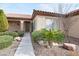 Well maintained single-story house featuring a welcoming entryway and desert landscaping at 2052 Powder Springs St, Henderson, NV 89052