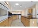 Spacious kitchen features an island, stainless appliances, and ample counter space at 2052 Powder Springs St, Henderson, NV 89052