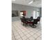 Comfortable common room with a table, chairs, and views into the exercise room at 221 Oro Canyon St, Henderson, NV 89074