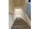 Carpeted stairs provide a transition between levels of the home, enhancing accessibility and convenience at 221 Oro Canyon St, Henderson, NV 89074