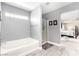 Bathroom featuring a soaking tub and a glass-enclosed shower at 231 Pioneers Peak Ave, Henderson, NV 89002