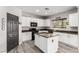 Modern kitchen featuring stainless steel appliances, recessed lighting, and dark hardware at 231 Pioneers Peak Ave, Henderson, NV 89002