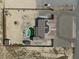 Top-down aerial shot of the house and yard, featuring a pool, desert landscaping, and exterior buildings at 2330 Deadwood St, Pahrump, NV 89048