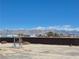 A view of a spacious backyard with mountain views at 2330 Deadwood St, Pahrump, NV 89048
