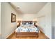 Cozy bedroom with hardwood floors, comfortable bedding, and closet at 2330 Deadwood St, Pahrump, NV 89048