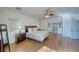 Spacious primary bedroom with wood floors and attached bathroom at 2330 Deadwood St, Pahrump, NV 89048