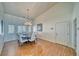 Bright dining room featuring hardwood floors and a modern chandelier at 2330 Deadwood St, Pahrump, NV 89048