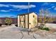 Exterior view of utility shed, perfect for extra storage space with design elements at 2330 Deadwood St, Pahrump, NV 89048