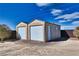 Detached garage for storage space and car parking with a wide garage door entrance at 2330 Deadwood St, Pahrump, NV 89048