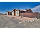 Well-maintained home with a secure fenced yard and low-maintenance landscaping at 2330 Deadwood St, Pahrump, NV 89048