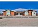 Charming single-story home with xeriscaping, solar panels, and unique architectural style at 2330 Deadwood St, Pahrump, NV 89048