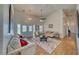 Spacious living room with hardwood floors and natural light flowing throughout at 2330 Deadwood St, Pahrump, NV 89048