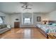 Spacious main bedroom with hardwood floors, sitting area, and large window seat at 2330 Deadwood St, Pahrump, NV 89048