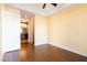 Main bedroom with wood floors and an ensuite bathroom at 26 Via Vasari # 204, Henderson, NV 89011