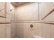 An elegant shower with decorative tile at 26 Via Vasari # 204, Henderson, NV 89011