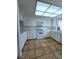 Functional kitchen with ample cabinet space and tile flooring at 3058 Conquista Ct, Las Vegas, NV 89121