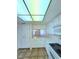 White kitchen with ample cabinet space, and tiled backsplash at 3058 Conquista Ct, Las Vegas, NV 89121