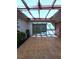 Sliding glass doors opening onto enclosed outdoor patio at 3058 Conquista Ct, Las Vegas, NV 89121