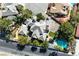 Top-down aerial view displays the home with a pool and lush greenery, bordered by the quiet residential street at 3111 Coachlight Cir, Las Vegas, NV 89117