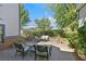 Inviting backyard patio featuring comfortable seating for outdoor entertaining at 3111 Coachlight Cir, Las Vegas, NV 89117