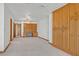 Large bedroom includes built-in shelving and cabinets for ample storage at 3111 Coachlight Cir, Las Vegas, NV 89117