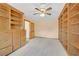 Spacious bedroom featuring custom built-in cabinetry and shelving at 3111 Coachlight Cir, Las Vegas, NV 89117