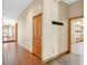 Hallway features hardwood floors and built-in wooden storage cabinets, offering plenty of storage solutions at 3111 Coachlight Cir, Las Vegas, NV 89117