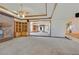 Spacious living room features a brick fireplace, custom built-ins, and wood trim at 3111 Coachlight Cir, Las Vegas, NV 89117