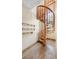 Detailed shot of a custom wooden spiral staircase at 3111 Coachlight Cir, Las Vegas, NV 89117