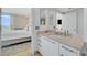 Bathroom vanity with a sink and the bedroom in the background at 322 Karen Ave # 703, Las Vegas, NV 89109