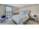 Comfortable bedroom featuring a large window offering views of the city at 322 Karen Ave # 703, Las Vegas, NV 89109