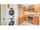 This contemporary kitchen features stainless steel appliances and sleek wood cabinets for a modern design at 322 Karen Ave # 703, Las Vegas, NV 89109