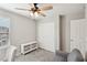 Bright bedroom with a ceiling fan, closet, and neutral decor at 3281 Pergusa Dr, Henderson, NV 89044