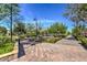Scenic paved pathways through a lush community park with trees and green spaces at 3281 Pergusa Dr, Henderson, NV 89044