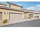 Beautiful townhome featuring a two-car garage and a tiled roof at 3281 Pergusa Dr, Henderson, NV 89044