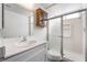 Clean bathroom with a vanity and a glass-enclosed shower stall at 4406 Flowerdale Ct, Las Vegas, NV 89103
