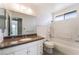 This is a primary bathroom featuring tile floors and a shower at 4406 Flowerdale Ct, Las Vegas, NV 89103