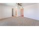 Bright and spacious bedroom with neutral carpeting and ample closet space at 4406 Flowerdale Ct, Las Vegas, NV 89103