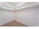 Walk-in closet with carpet, shelving, and clothing rods for storage at 4406 Flowerdale Ct, Las Vegas, NV 89103