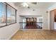 Living room boasts fireplace and views to the backyard at 4406 Flowerdale Ct, Las Vegas, NV 89103