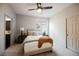 Cozy bedroom with neutral tones, plush carpet, and a comfortable bed, creating a serene retreat at 501 Proud Eagle Ln, Las Vegas, NV 89144
