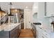 Contemporary kitchen with stainless steel appliances, a marble island, and stylish cabinetry at 501 Proud Eagle Ln, Las Vegas, NV 89144