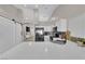 Modern kitchen features an oversized breakfast bar with seating space and pendant lighting, creating a perfect spot to enjoy meals at 5988 Turtle River Ave, Las Vegas, NV 89156
