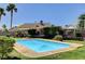 A sparkling backyard pool with mature landscaping, providing a relaxing oasis at 6513 Echo Crest Ave, Las Vegas, NV 89130