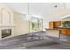 Inviting living room features fireplace, stylish lighting, and access to outdoor space at 6513 Echo Crest Ave, Las Vegas, NV 89130